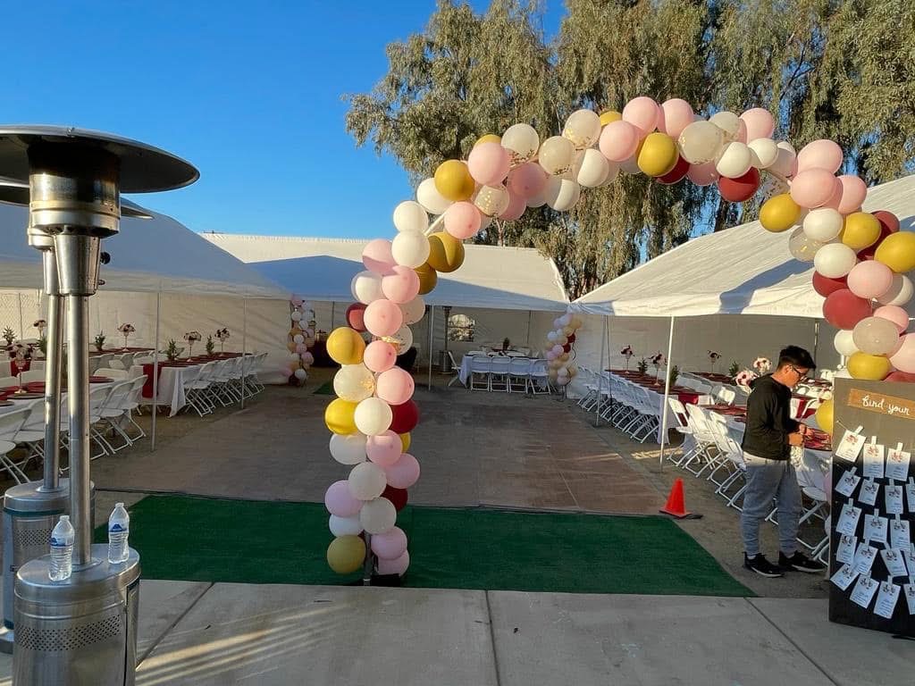 Beautiful party setup with balloon arch